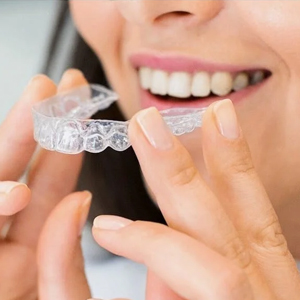 Can I Get Invisalign When I Have Porcelain Veneers? | Newark